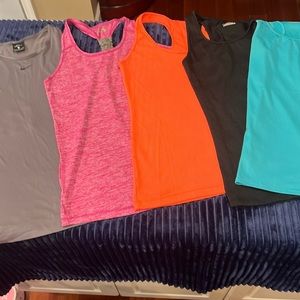 Bundle of 6 Athletic Tanks:1 Nike Pro,1 Nike, 2 Under Armor, 1 Adidas and 1 Head